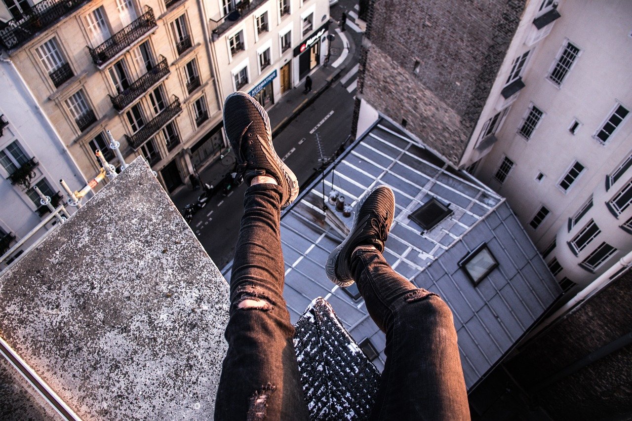 a guy jumping on ceiling