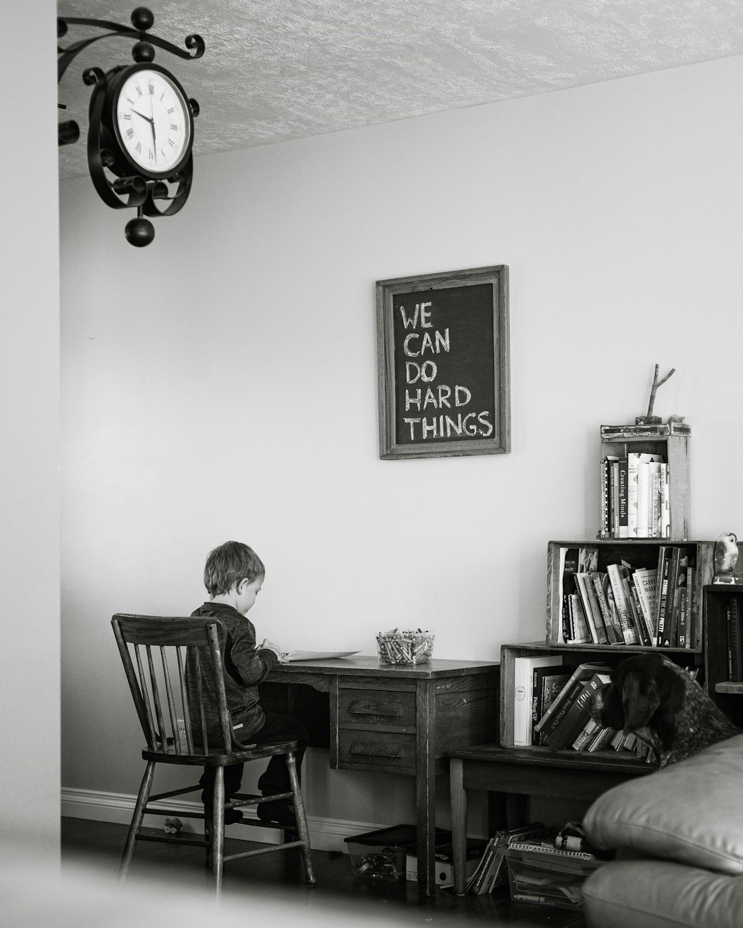 A boy is studying on desk