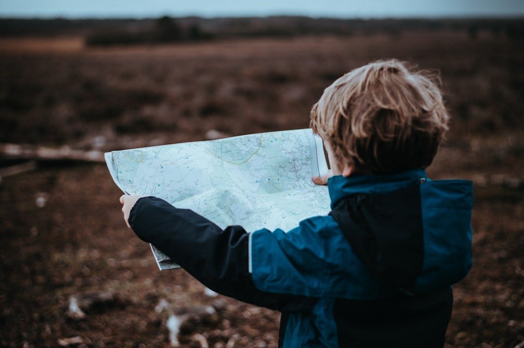 A child looking at the map