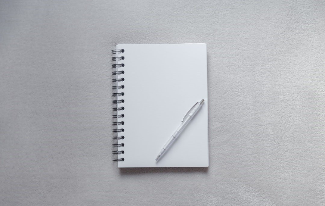 A Note Pad with a pen