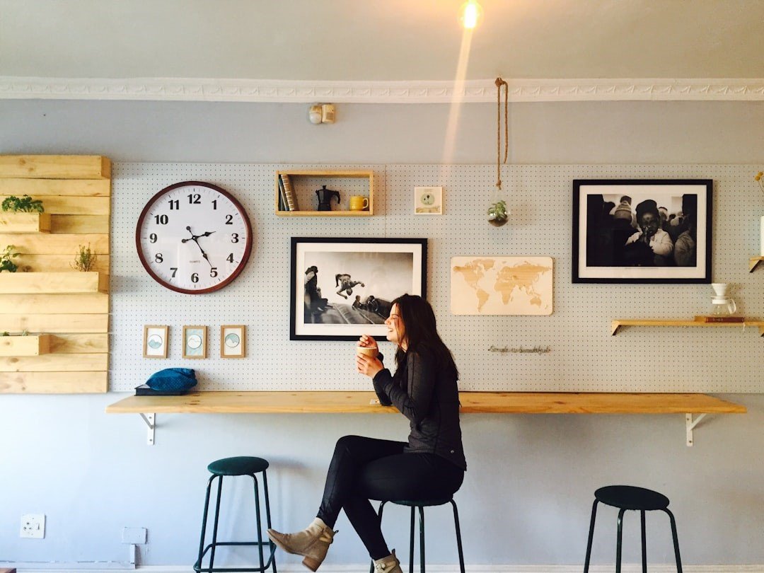 A woman is enjoying a cup of coffee