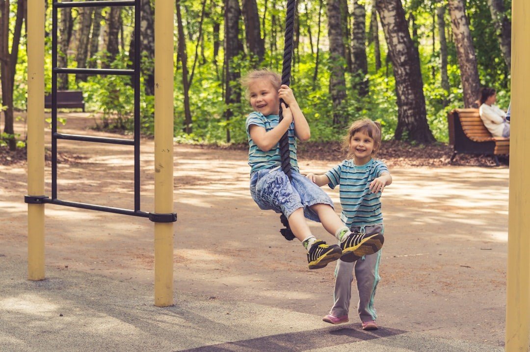 A couple of girls playing at playground