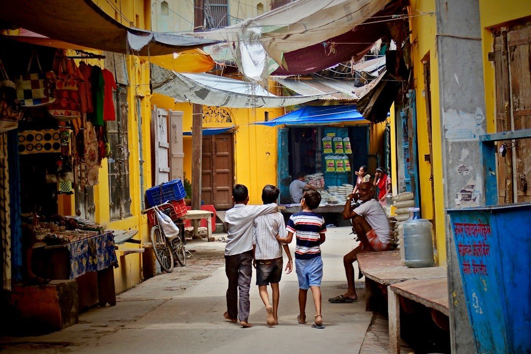 3 boys walking on exotic street