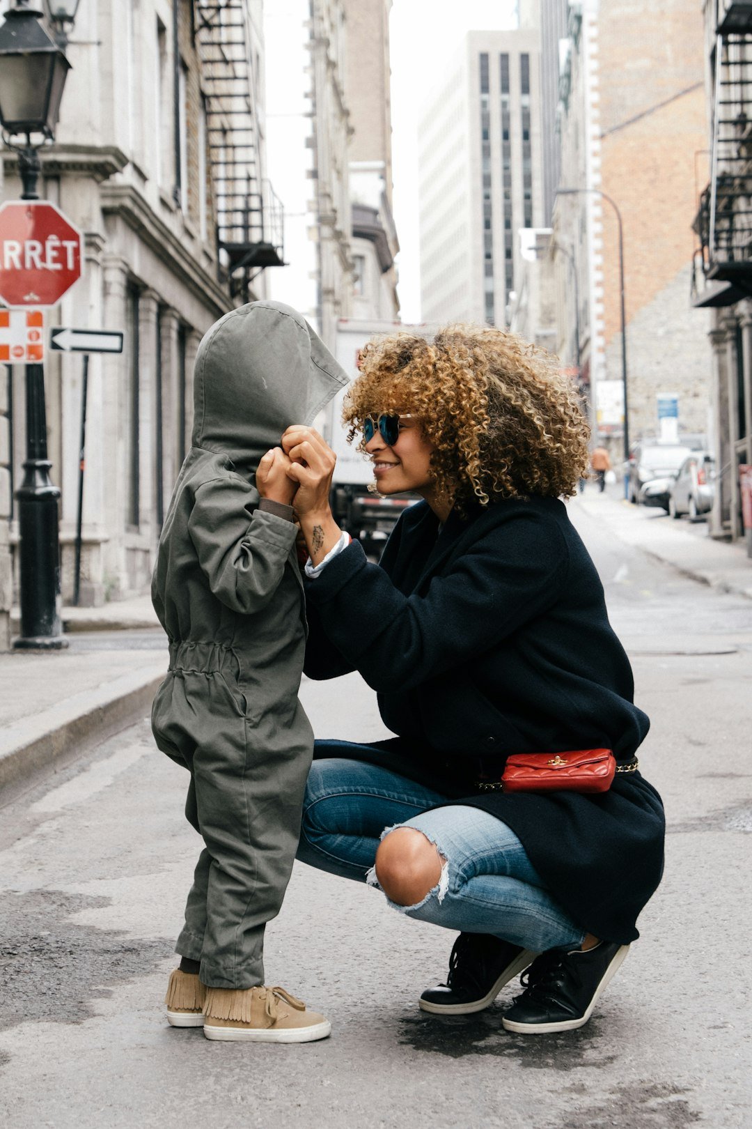 A woman and a son talking on street