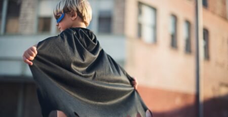 A boy with superhero costume